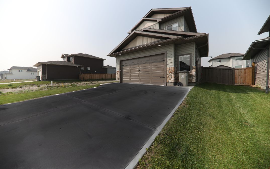 Concrete driveway floor with heat damage.